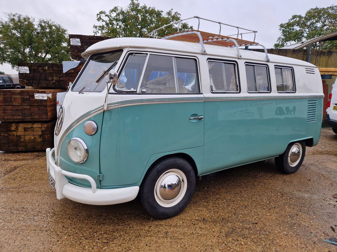Turquoise and white split screen bus