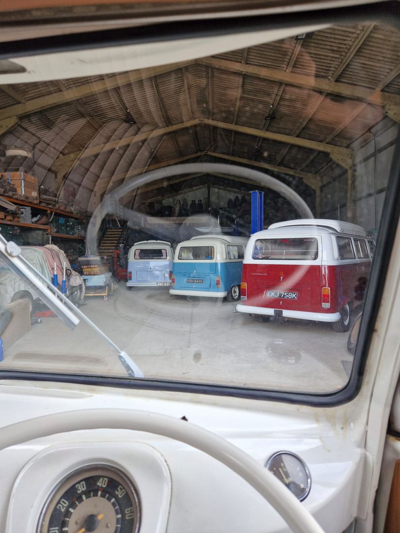 A view into the workshop through a classic VW windscreen
